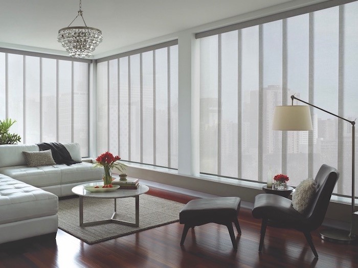 Living room with large panel shades